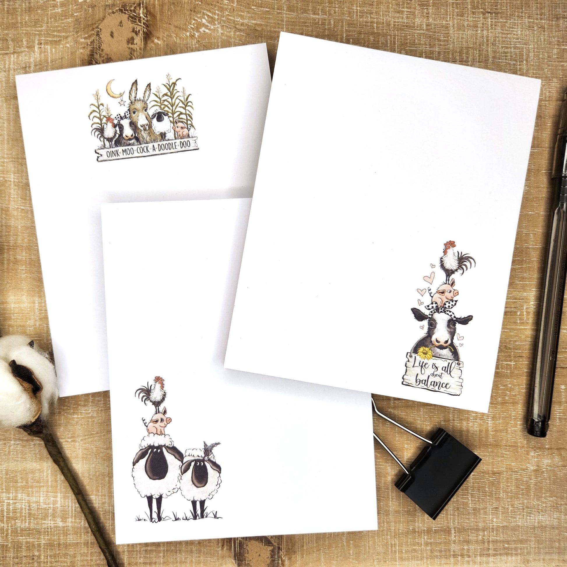 Down on the Farm collection of 3 notepad featuring cows, sheep, and assorted farm animals.