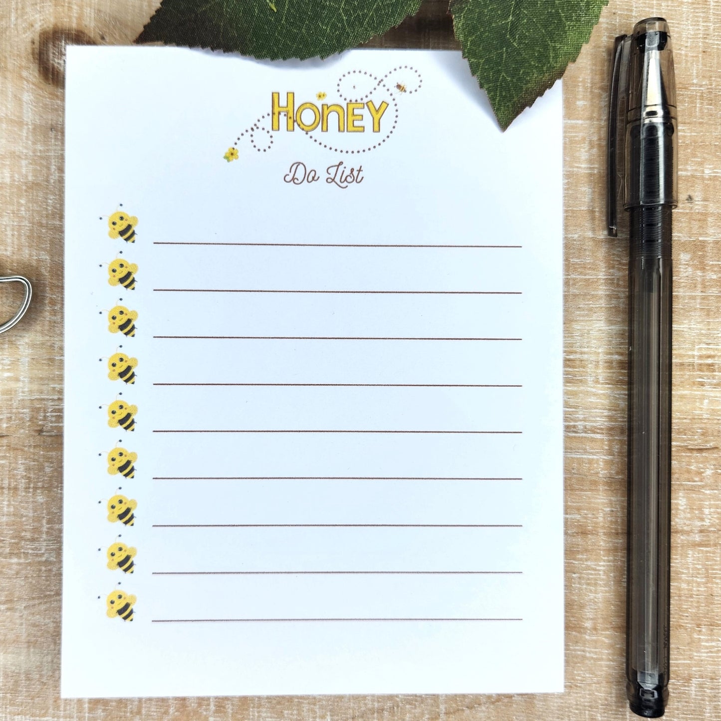 Honey do list with bee accents.  Lines with bees at each line.