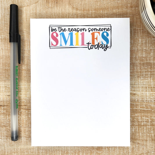 be the reason someone smiles today notepad with pen