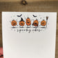 close up of dancing pumpkins at the top of the pages.