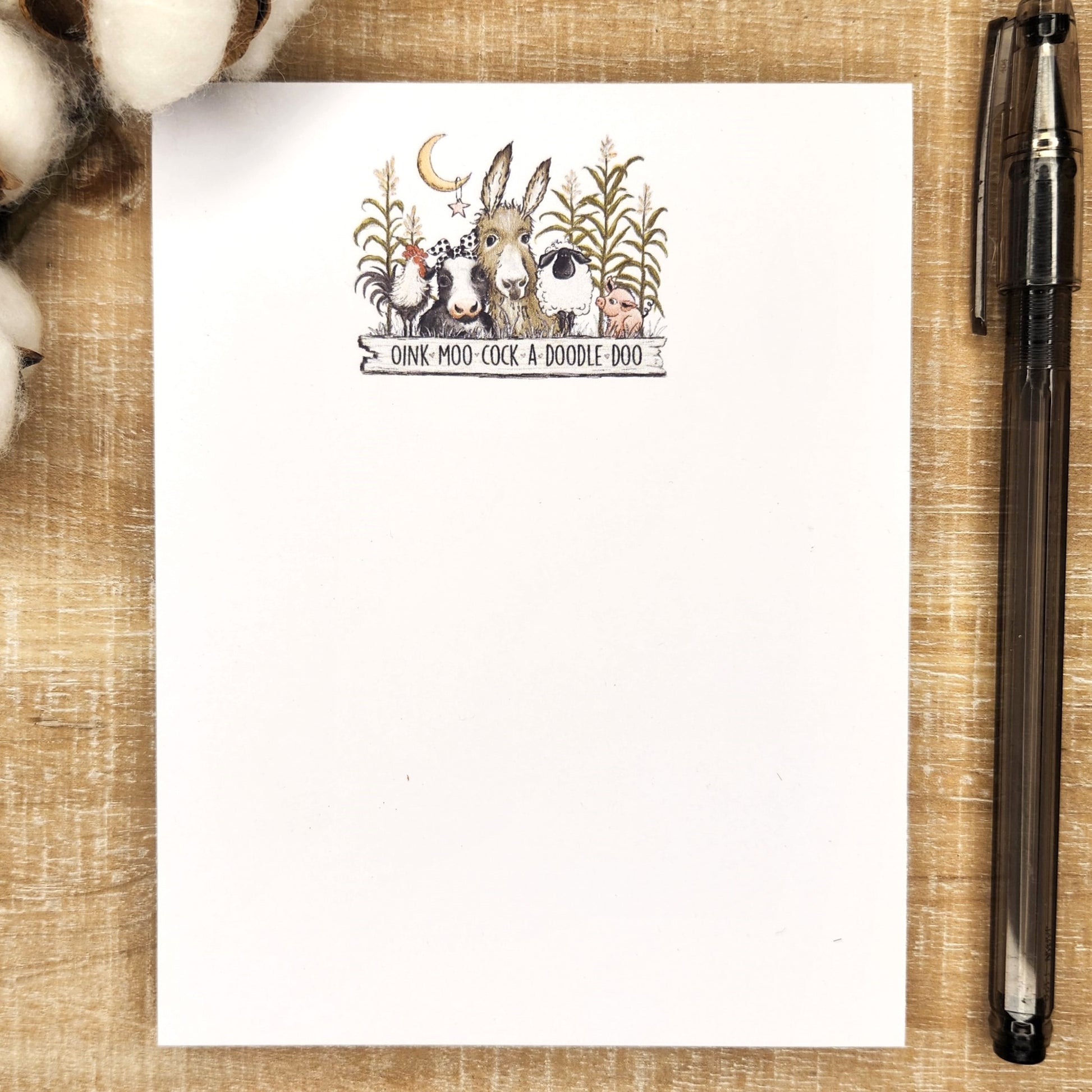 A group of farm animals, rooster, cow, donkey, sheep and pig, are standing over a sign that says oink moo cock a doodle doo.  a moon and corn stalks are also in the picture.  design in the top center of the page. 